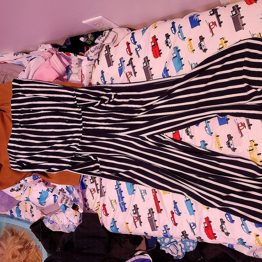dark blue and white striped jump suit